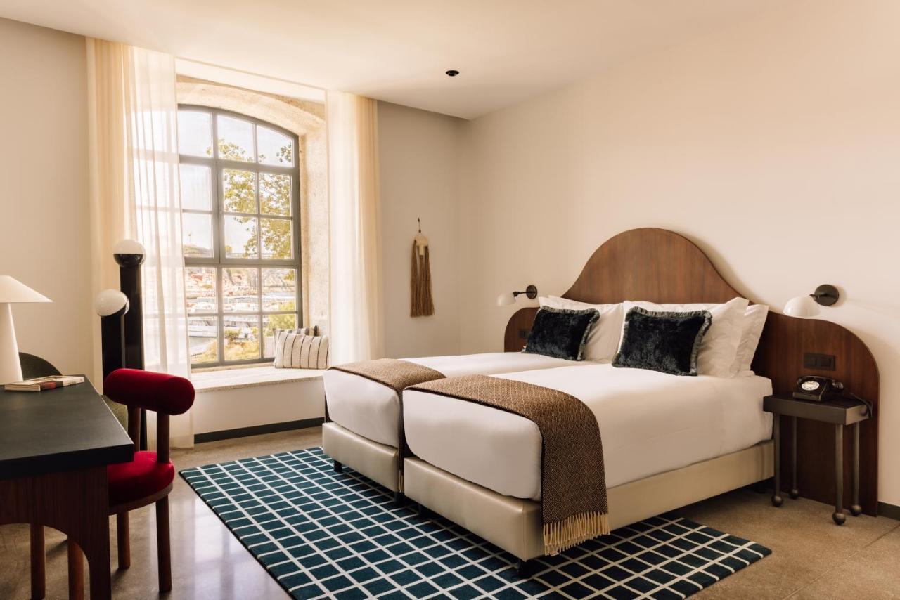 The Rebello Hotel & Spa - Small Luxury Hotels Of The World Vila Nova de Gaia Kültér fotó A guest room at the Hotel 57