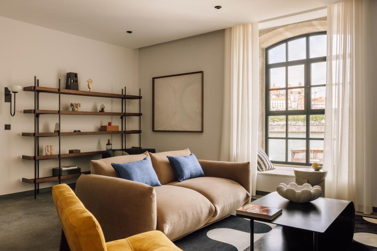 The Rebello Hotel & Spa - Small Luxury Hotels Of The World Vila Nova de Gaia Kültér fotó The living room of a two-bedroom apartment at The Standard East Village